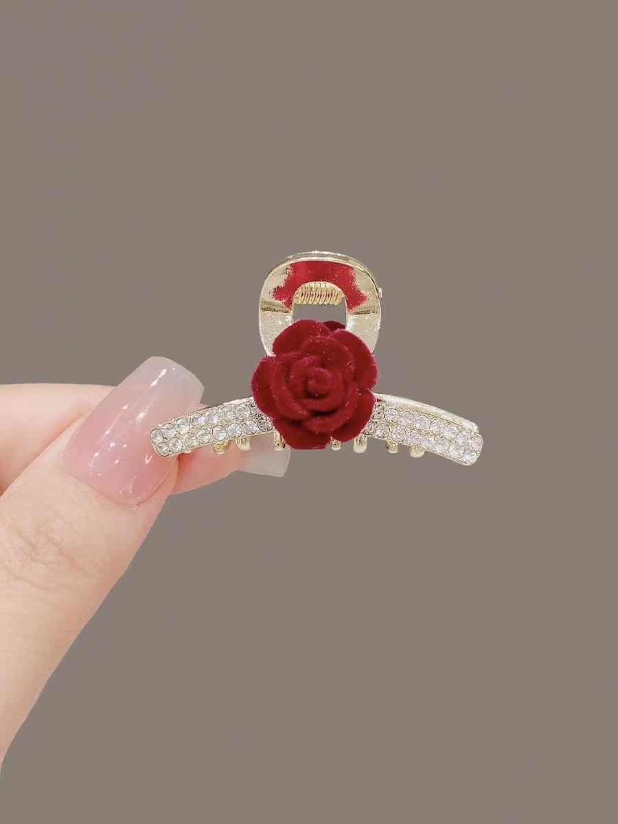 植绒水钻4.5公分小花朵中号抓夹。款式多多可选