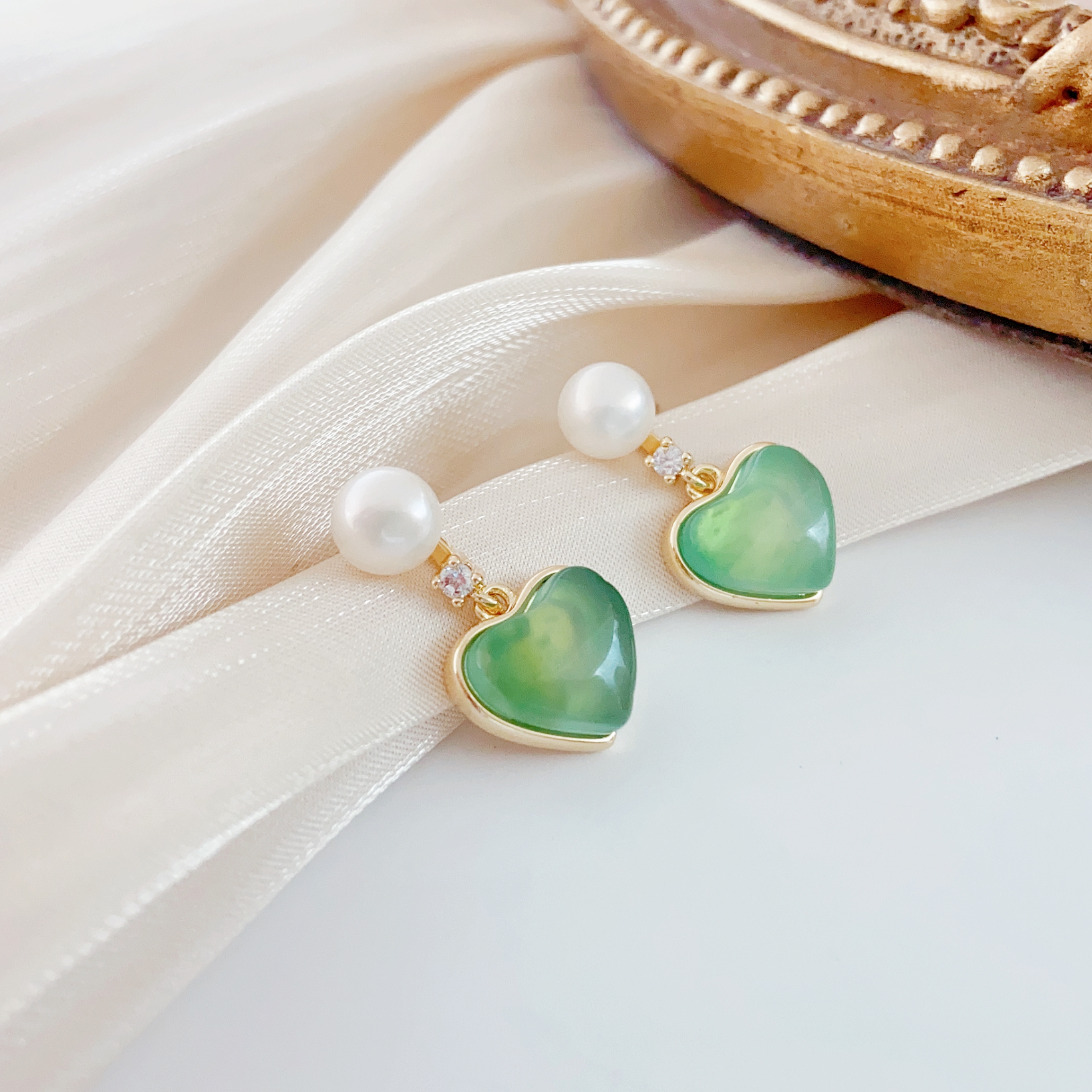 A pair of freshwater pearl ear studs s925 sterling silver needle ear studs are versatile new earrings with a niche design Application Scenario