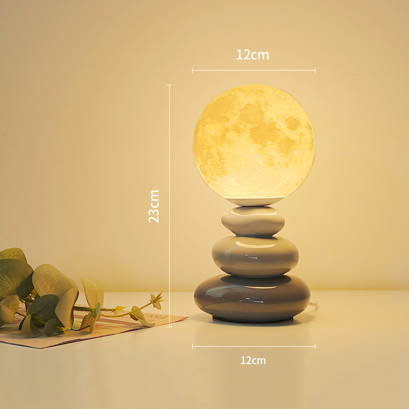 Ceramic table lamp, cream style, high-end bedside lamp, bedroom sleep planet lamp, ambient lamp, decorative night lamp, stacked stone Application Scenario