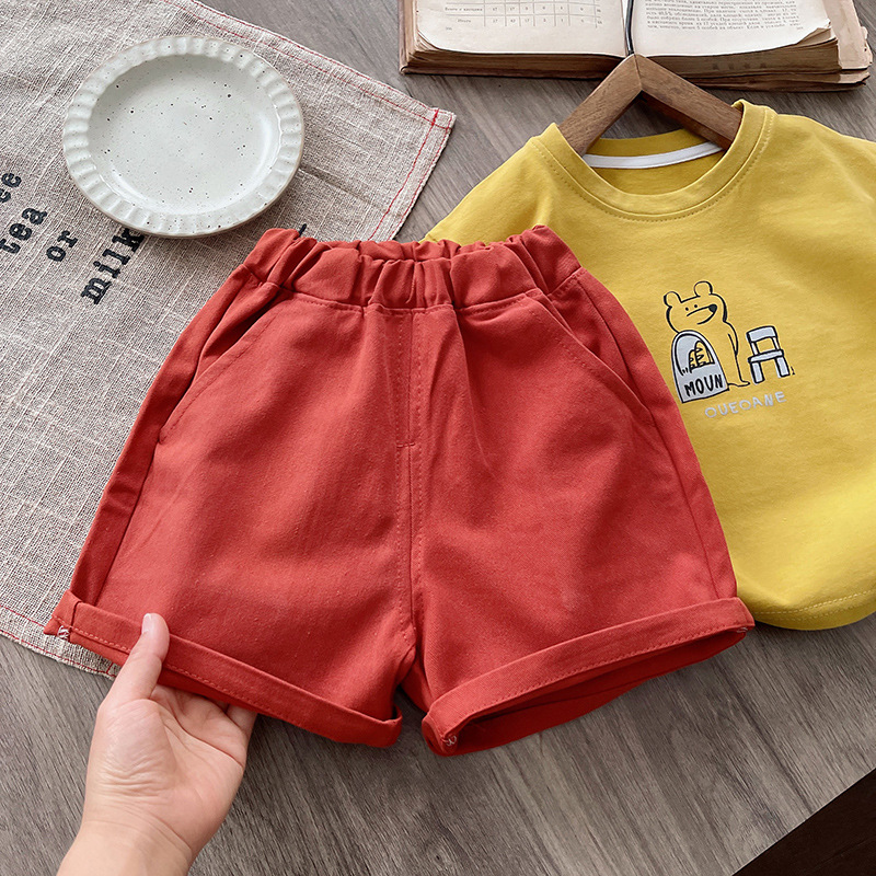 The new summer cartoon printed short-sleeved and short pants for boys and girls, two-piece sets, are casual and versatile. It's a trendy children's suit details Picture