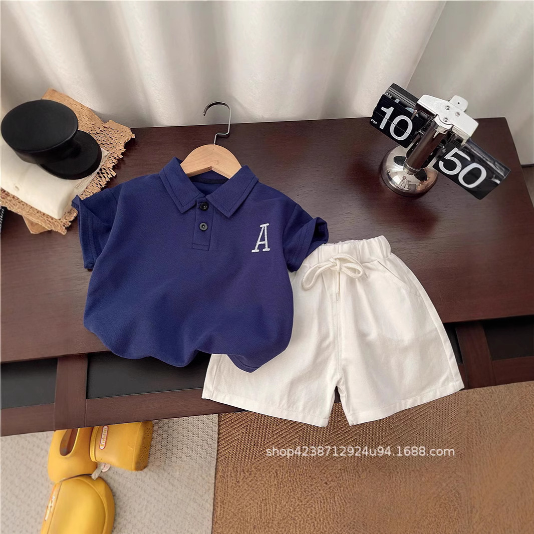 Korean children's summer new embroidered polo shirts for boys and girls, baby short sleeves and shorts, stylish two-piece set, trendy full figure