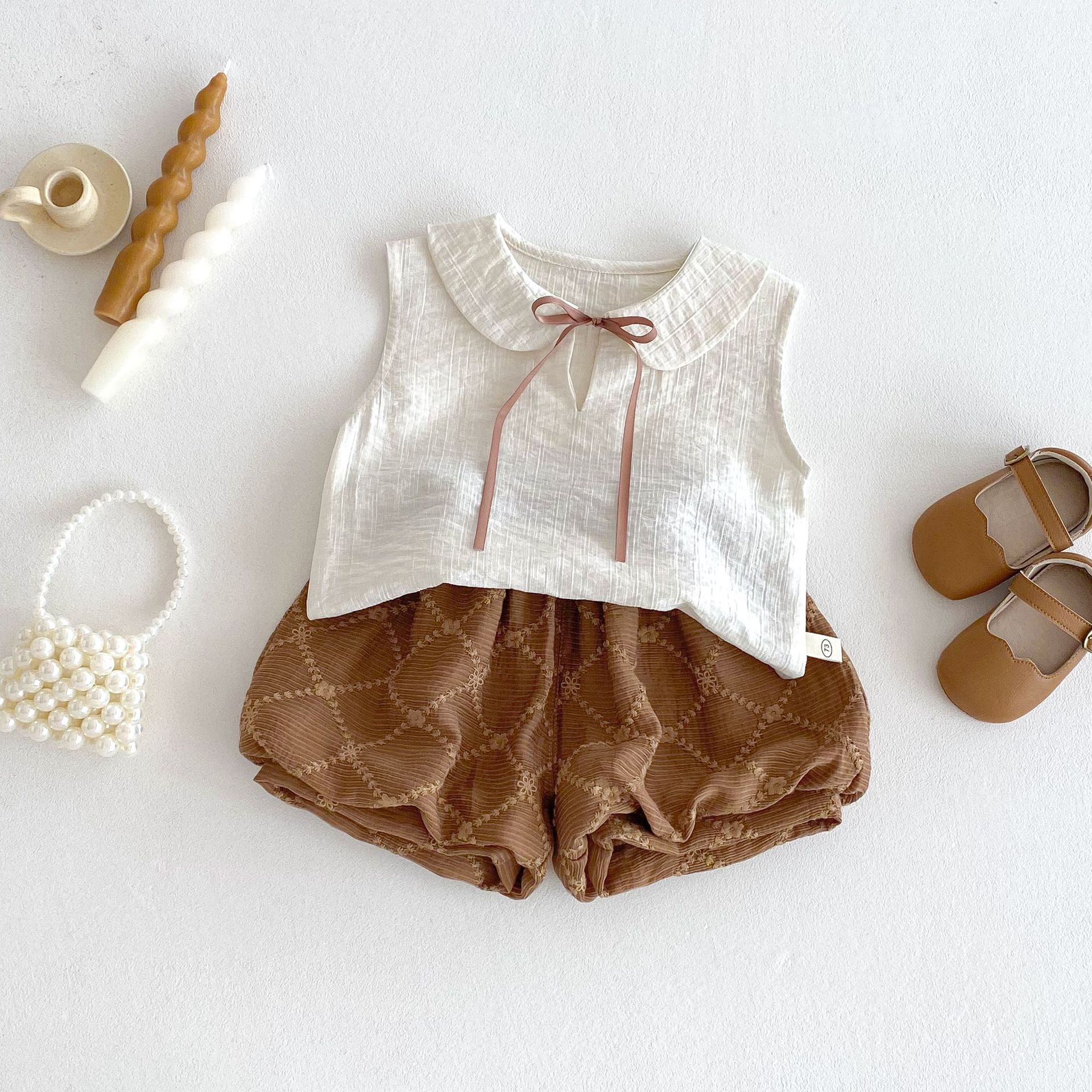 Girls' solid-color baby shirt 2025 new summer baby fashion sleeveless vest Children's Korean-style solid-color flower bud pants full figure