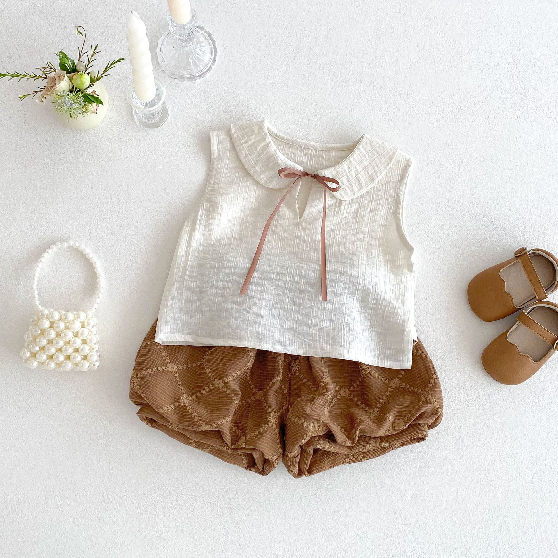 Girls' solid-color baby shirt 2025 new summer baby fashion sleeveless vest Children's Korean-style solid-color flower bud pants details Picture