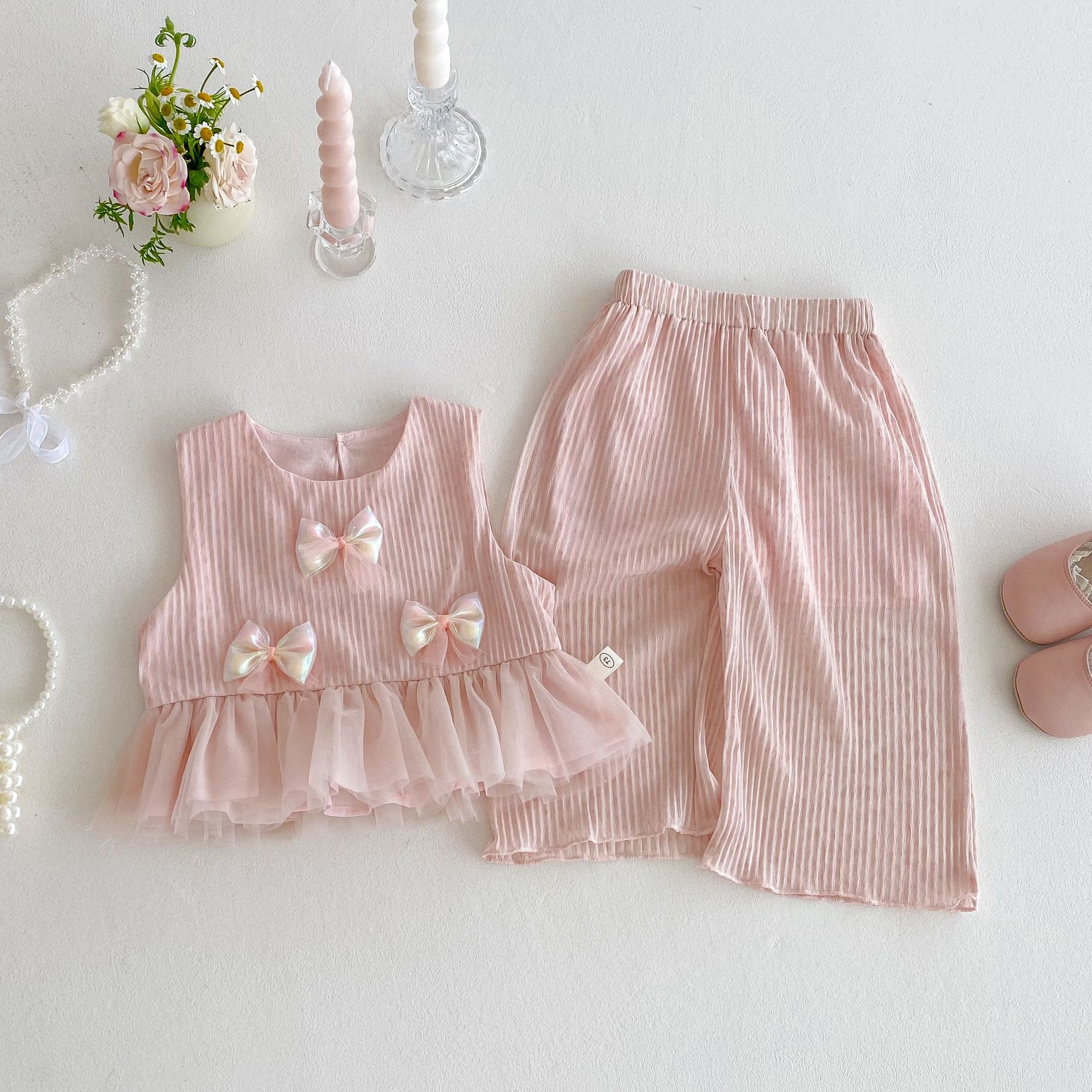 A new Korean version set for girls 2025 summer, featuring a stylish bow doll shirt and solid color wide-leg pants details Picture