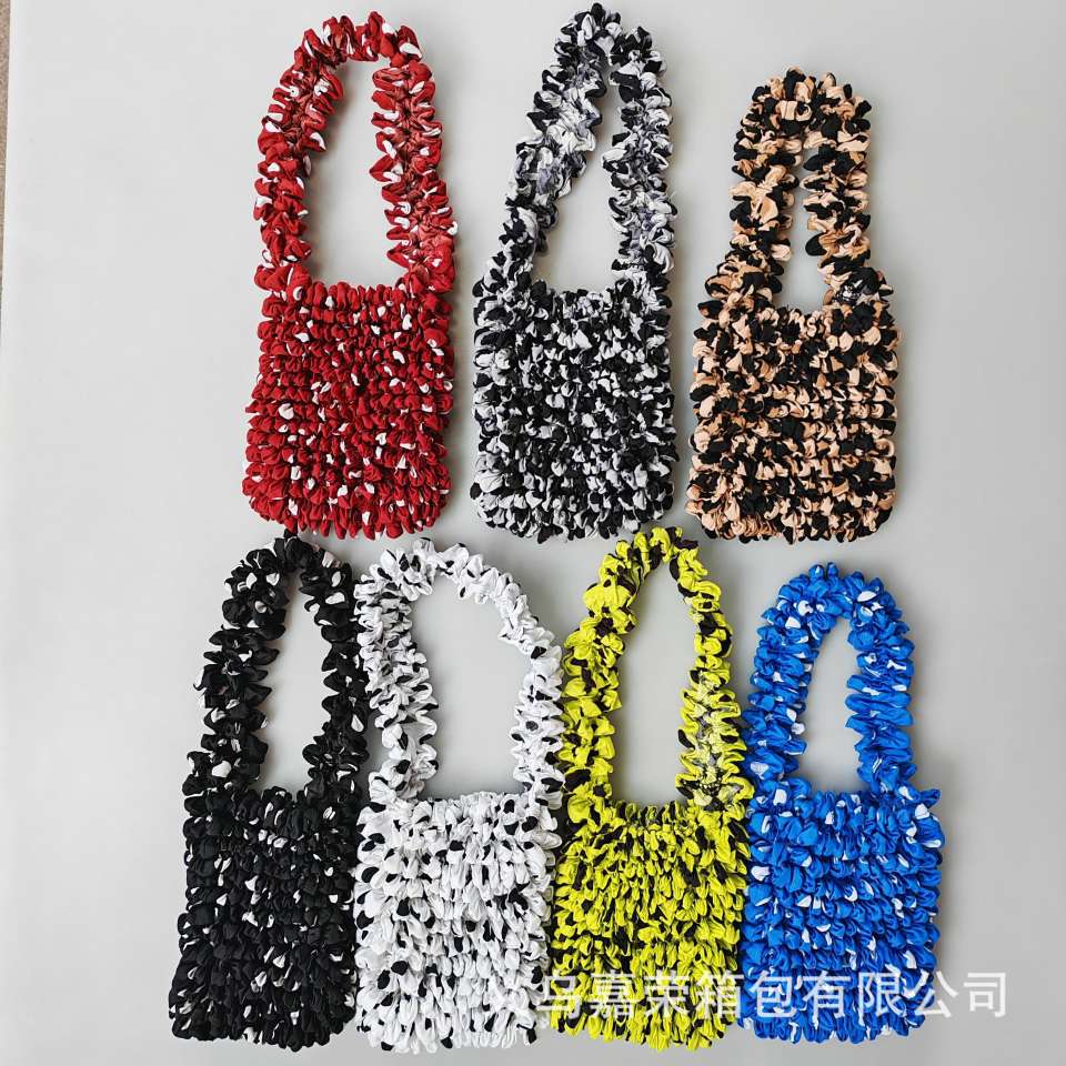 Popular Japanese and Korean pineapple bags, bubble bags, fashionable women's bags, multi-functional hand-held crossbody bags, casual leather goods and luggage, women's versatile and trendy new products Specification image