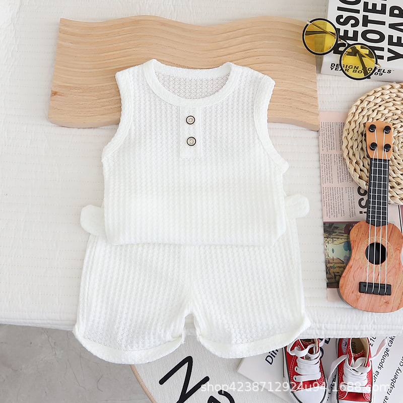 A new, stylish and casual Korean-style solid color waffle vest set for infants and toddlers in summer, a thin and breathable set details Picture
