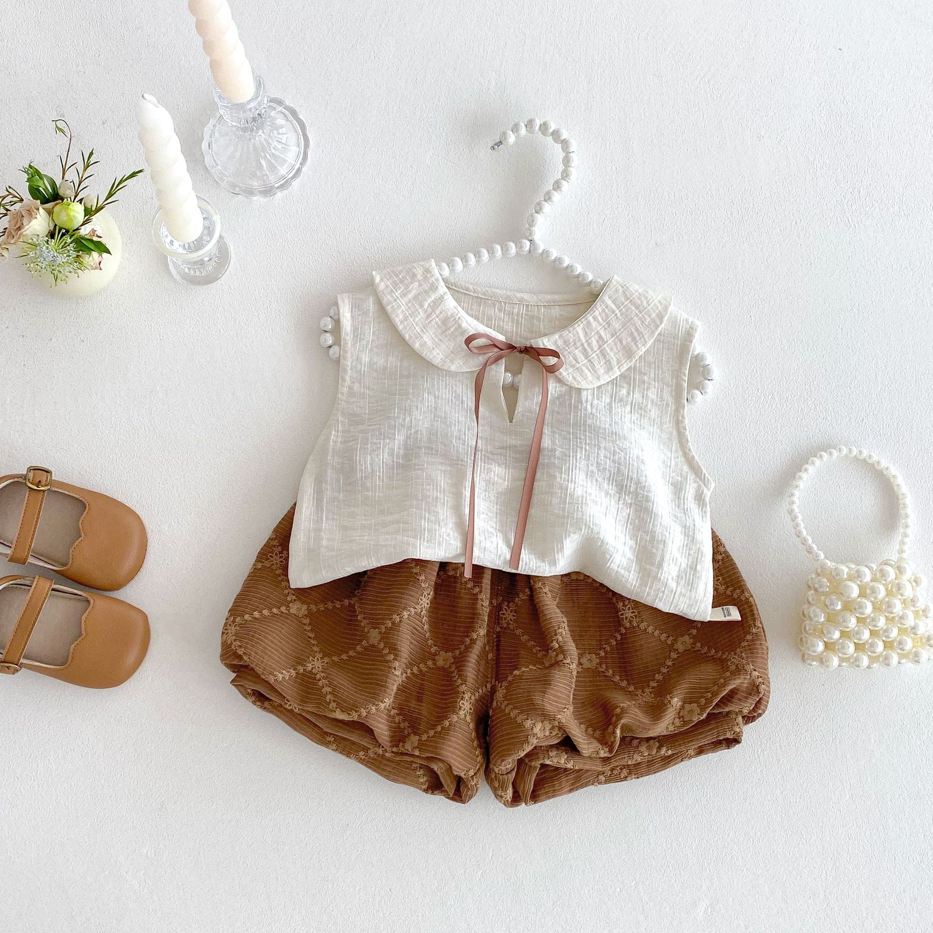 Girls' solid-color baby shirt 2025 new summer baby fashion sleeveless vest Children's Korean-style solid-color flower bud pants Specification drawing
