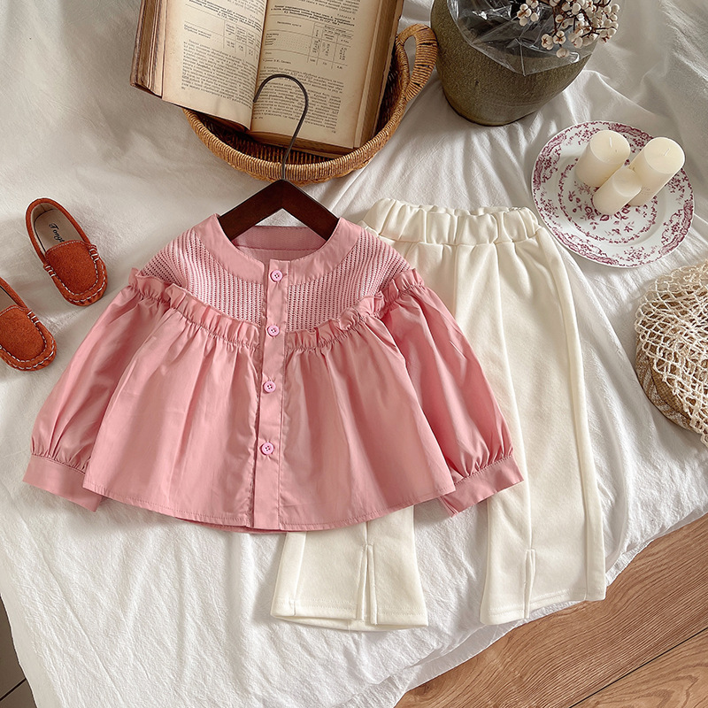 The 2024 autumn new Korean-style fashionable girls' outfit features a black fungus pink shirt paired with off-white flared pants details Picture