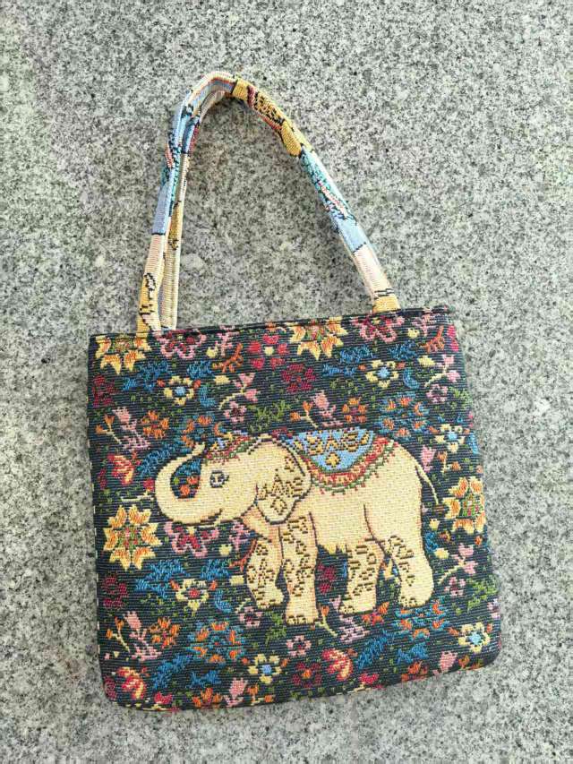 提花手提黑花小象手提包