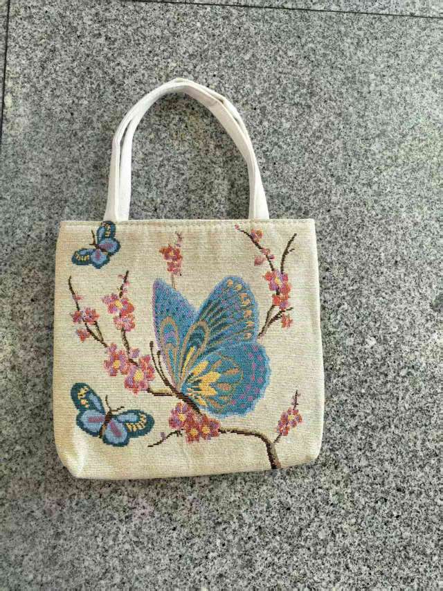 提花手提蝴蝶花型手提小包