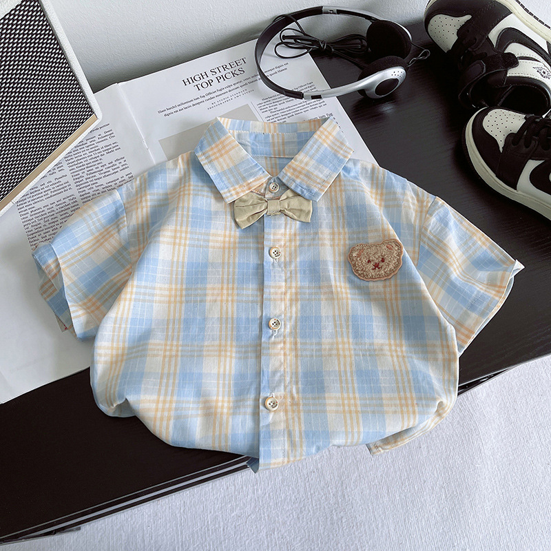 A new summer set for boys, featuring a stylish children's short-sleeved shirt with a checkered pattern and a cool two-piece Korean-style baby summer outfit Specification drawing
