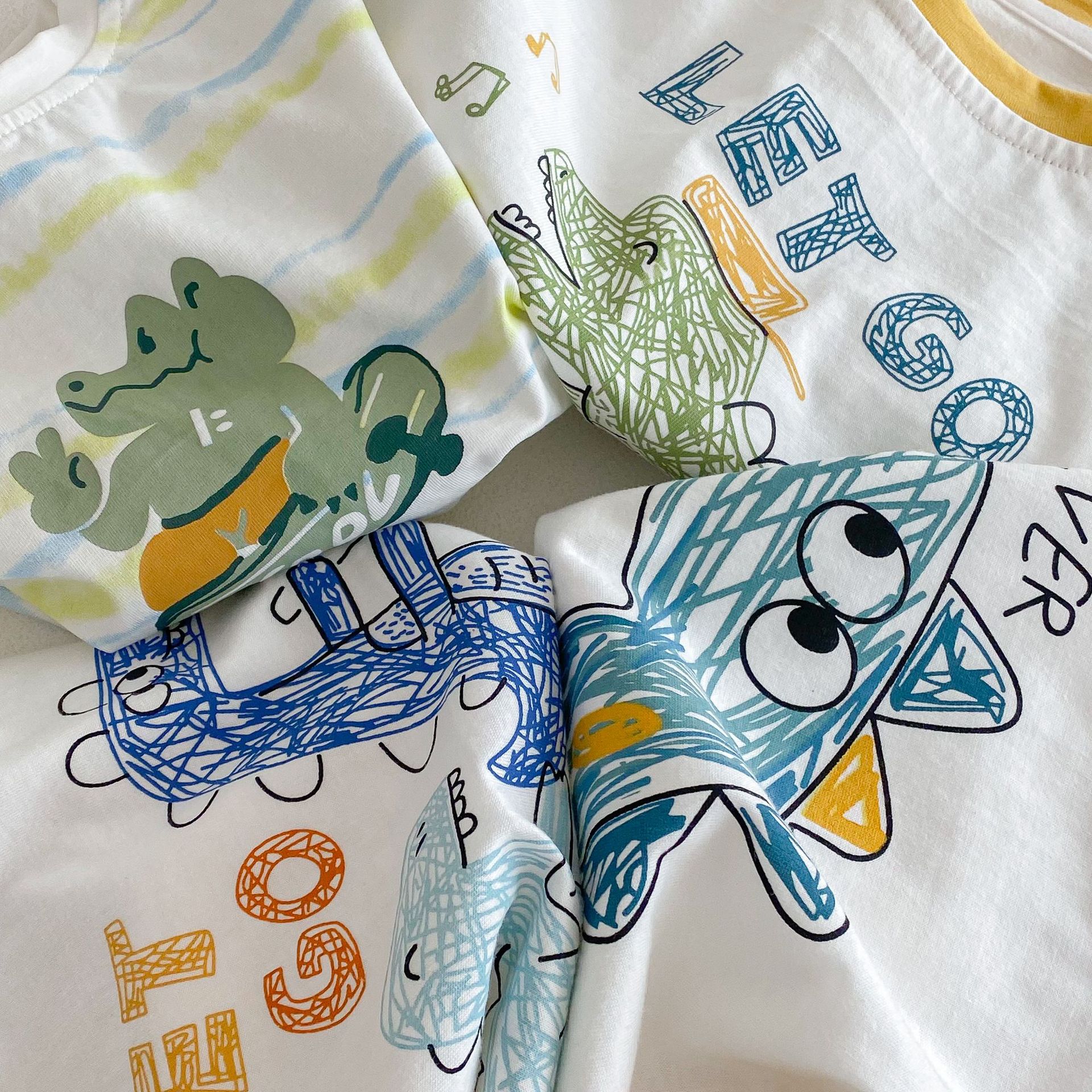Boys' cartoon T-shirt 2025 New Summer children's letter dinosaur base layer, thin baby stylish striped top details Picture
