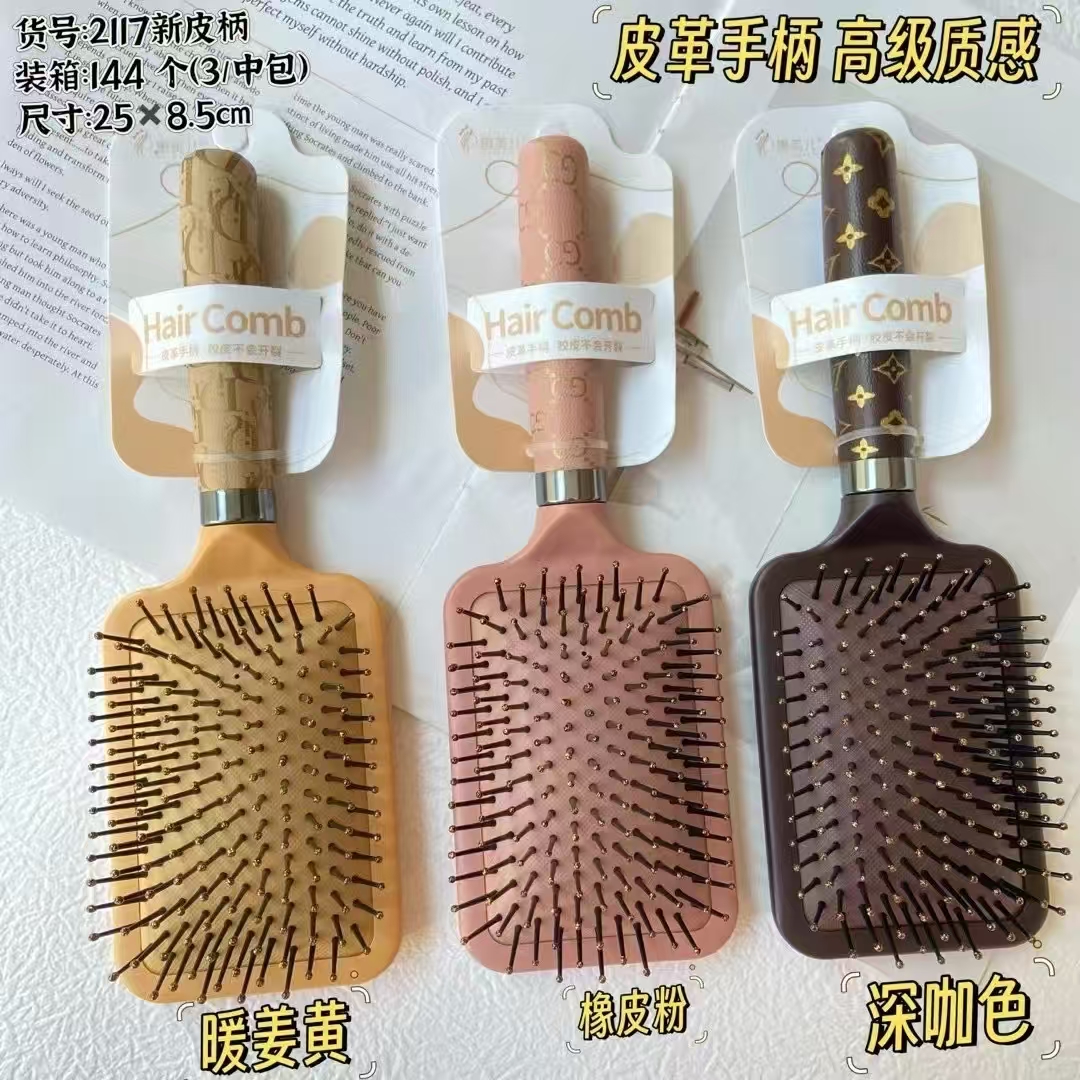 批发新款热销日用品塑料彩色儿童梳子供应塑料礼品小梳子1