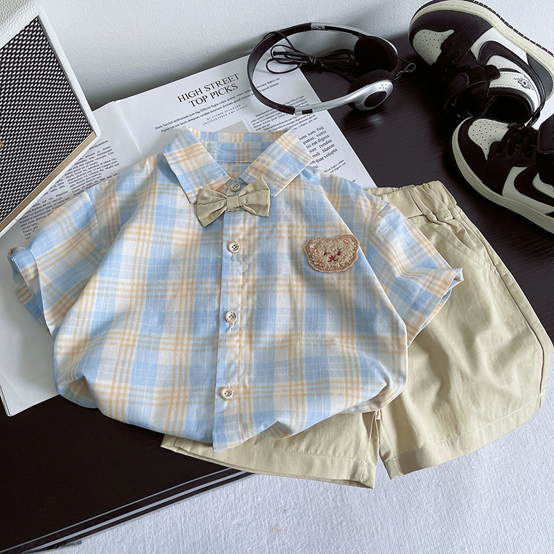 A new summer set for boys, featuring a stylish children's short-sleeved shirt with a checkered pattern and a cool two-piece Korean-style baby summer outfit full figure