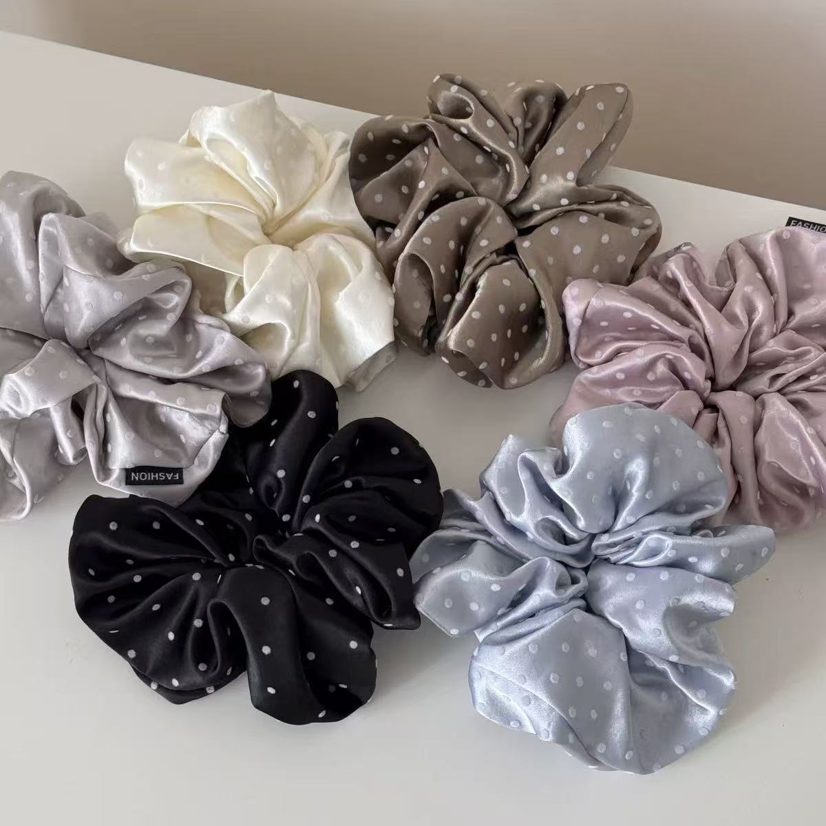 New satin flocked polka dot large intestine hair band, simple headwear, high-elasticity rubber band Specification image