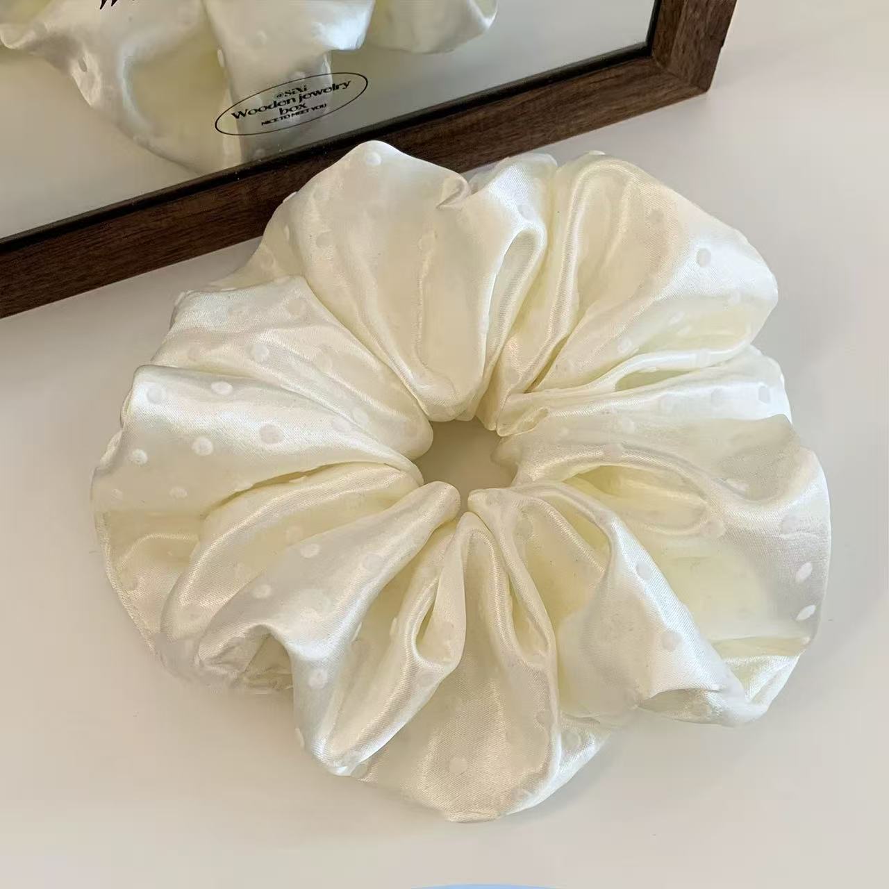 New satin flocked polka dot large intestine hair band, simple headwear, high-elasticity rubber band Application Scenario