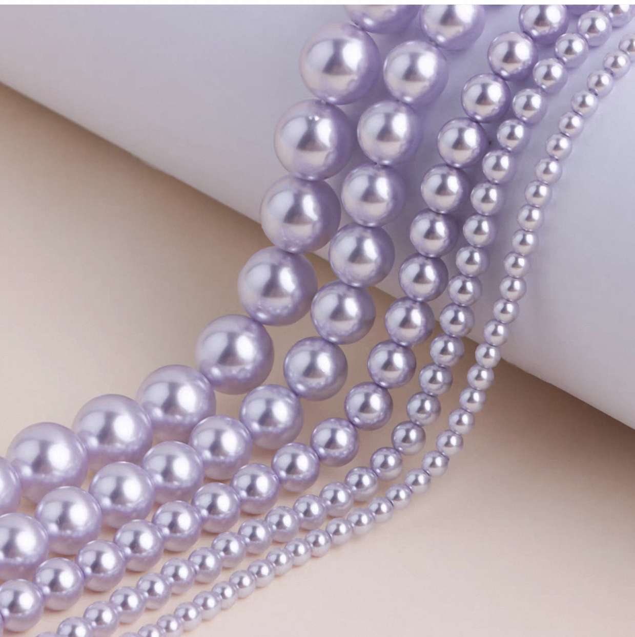 Semi-finished product of A-grade Shijia glass imitating pearl taro dream purple straight-hole glass beads Item Picture