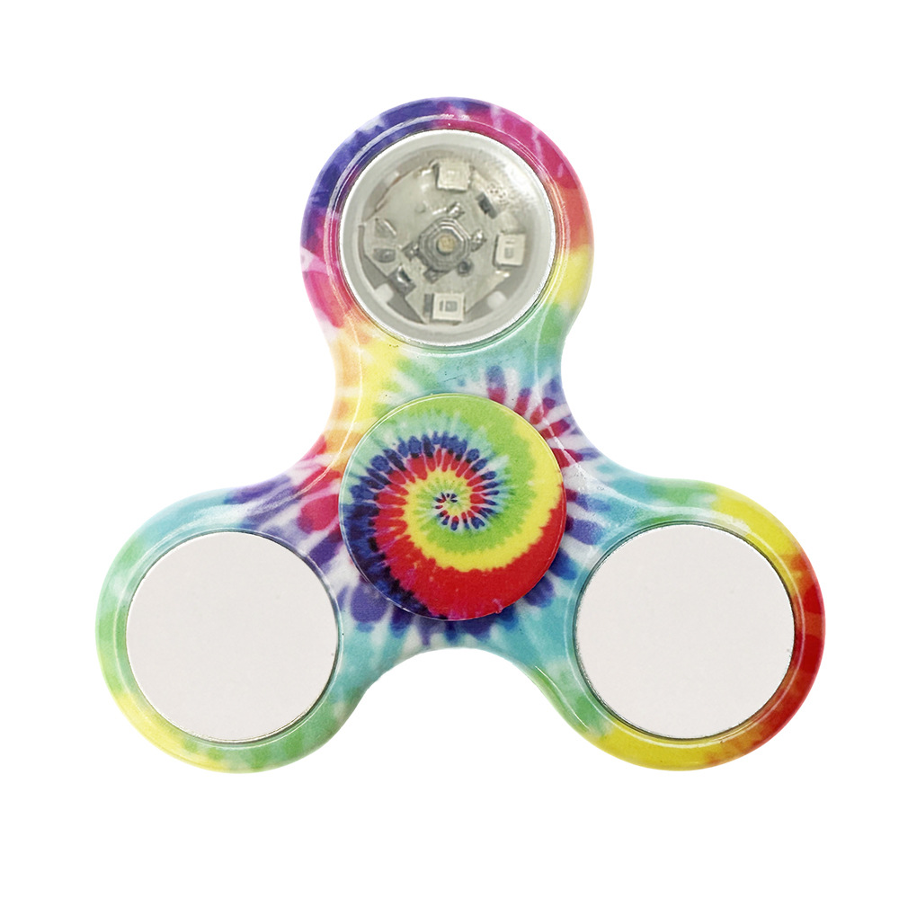 Our factory produces electroplated plastic spiral fidget spinners, luminous rainbow running lights and cross-border finger toys for wholesale Item Picture