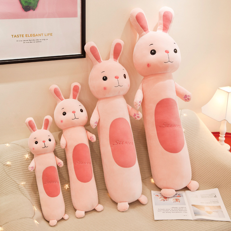 Creative new rabbit dolls are selling well at the street stall. They are children's plush toys, girls' bed dolls and long sleeping cushions Application Scenario