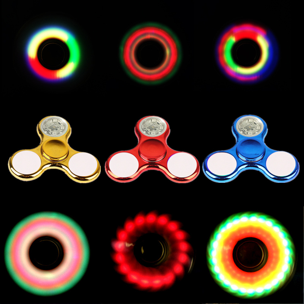 Our factory produces electroplated plastic spiral fidget spinners, luminous rainbow running lights and cross-border finger toys for wholesale full figure