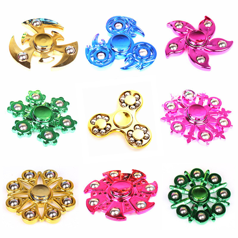 The factory produces handheld rotating steel ball finger gyroscopes, adult practice plastic finger gyroscopes and cross-border metal toys full figure