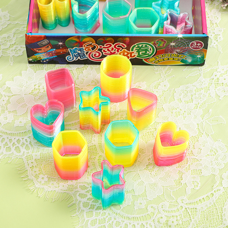 A box of 24 small, irregular-shaped rainbow rings, student toys, small gifts, wholesale push toys, kindergarten prizes details Picture