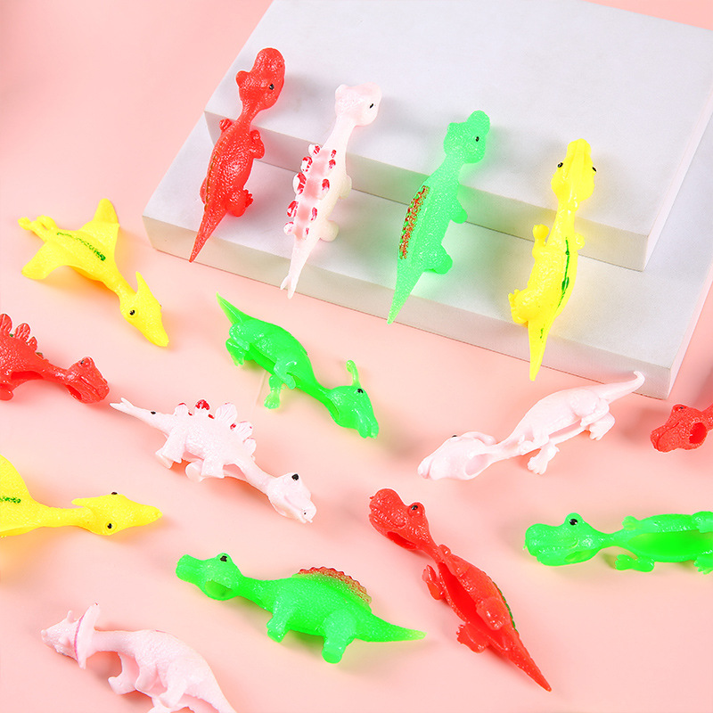 Wholesale of fun dinosaur catapulting toys, finger darts, little dinosaur stress-relieving soft rubber kindergarten gifts Specification drawing