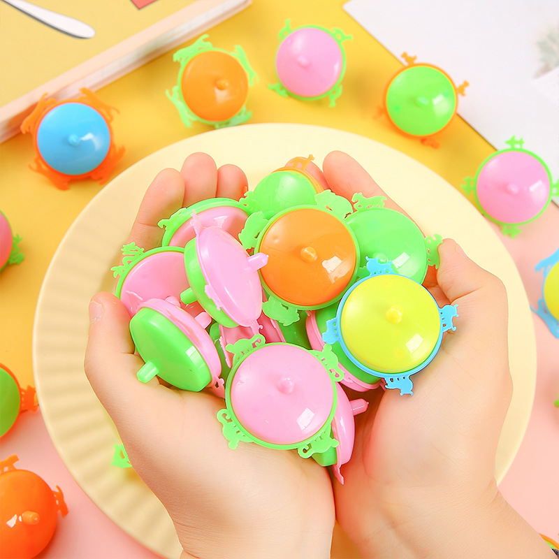 Colorful little gyroscope, nostalgic small toys, small ground spinning gyroscope, candy-colored children's toys wholesale full figure