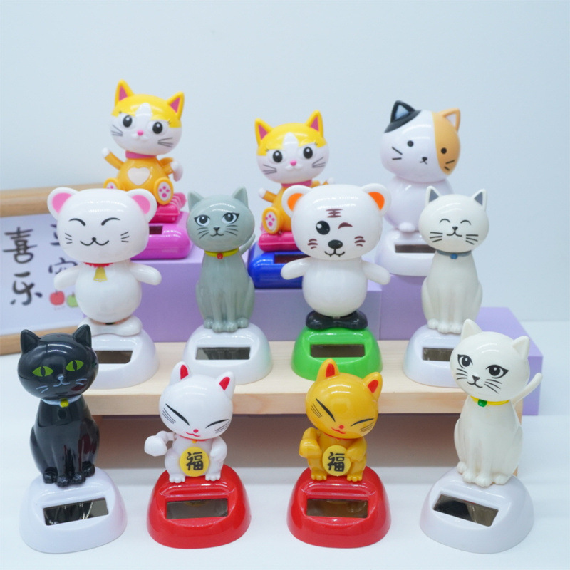 Solar-powered decorative items, cute money-making cats, creative car accessories, waving cat handicrafts, car interior decorative items and car decorations, cheap