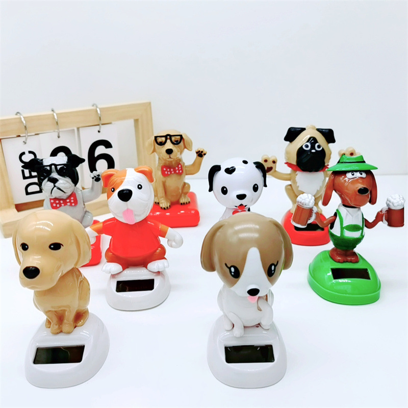 Cross-border car accessories, resin interior decorations, solar dog interior ornaments, shaking and waving dolls are selling well