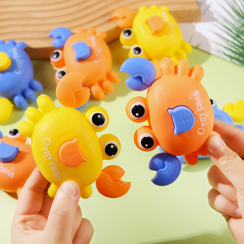 The Douyin night market stalls are selling popular children's educational toys, such as cute ocean crab press-type rebound toy cars Specification drawing