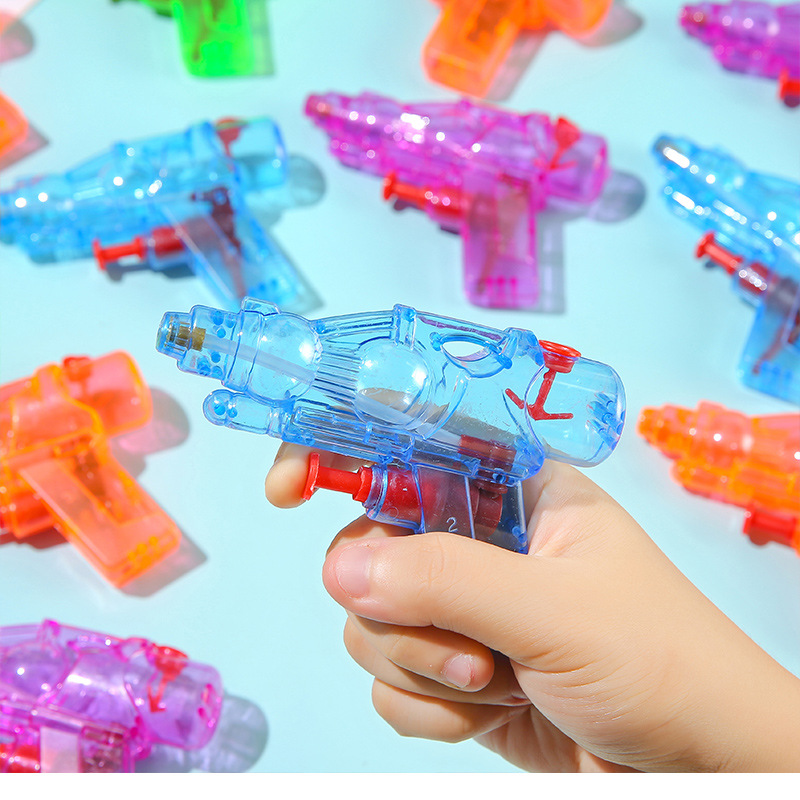Plastic transparent handheld small water gun, beach children's water play toy, children's toy water gun, mini water spray gun toy full figure