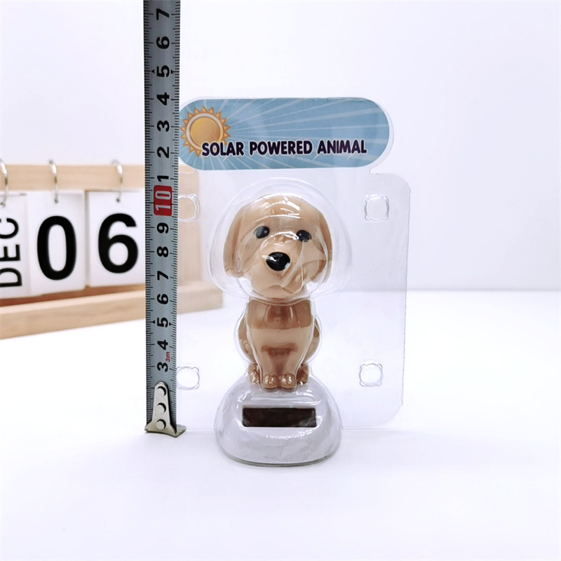 Cross-border car accessories, resin interior decorations, solar dog interior ornaments, shaking and waving dolls are selling well details Picture
