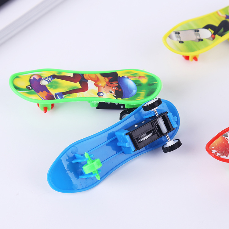 Wholesale of children's rebound scooters, cartoon skateboards, plastic small toys, kindergarten toys, prizes, skateboard models details Picture