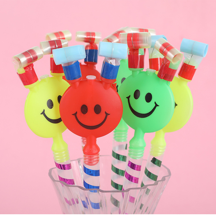 Kindergarten prizes: large blowing dragons, smiling faces, long poles, trumpets, whistles, rolls, children's toys, popular goods at street stalls full figure