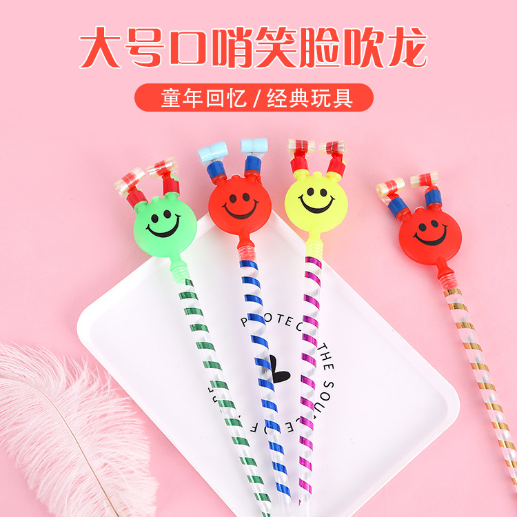 Kindergarten prizes: large blowing dragons, smiling faces, long poles, trumpets, whistles, rolls, children's toys, popular goods at street stalls details Picture