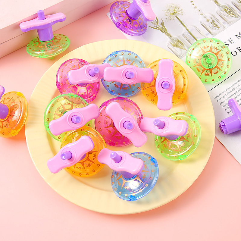 Luminous rotating gyroscope creative children's flashing toy, winding torque gyroscope ejection belt launcher toy Application Scenario