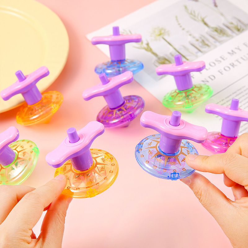 Luminous rotating gyroscope creative children's flashing toy, winding torque gyroscope ejection belt launcher toy full figure