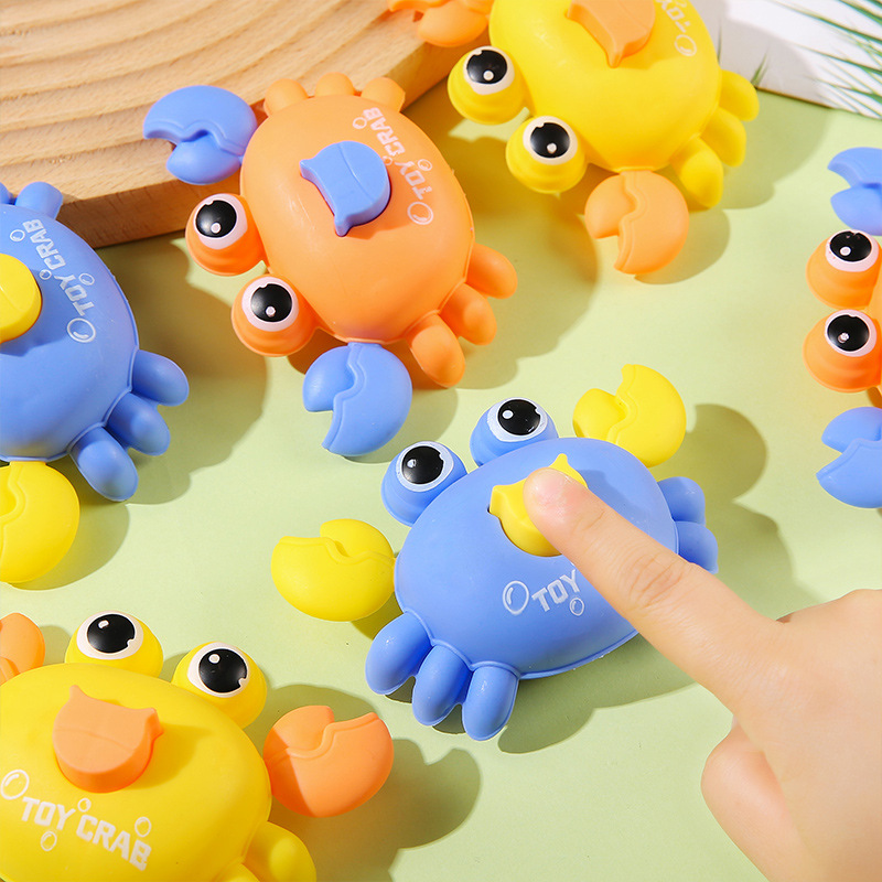 The Douyin night market stalls are selling popular children's educational toys, such as cute ocean crab press-type rebound toy cars details Picture