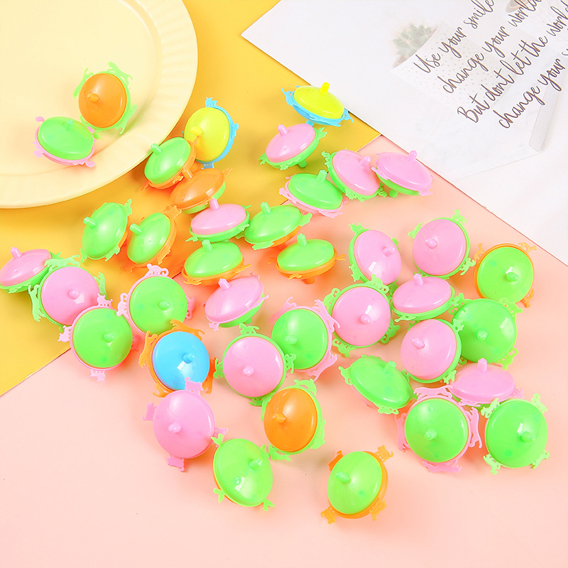 Colorful little gyroscope, nostalgic small toys, small ground spinning gyroscope, candy-colored children's toys wholesale Application Scenario