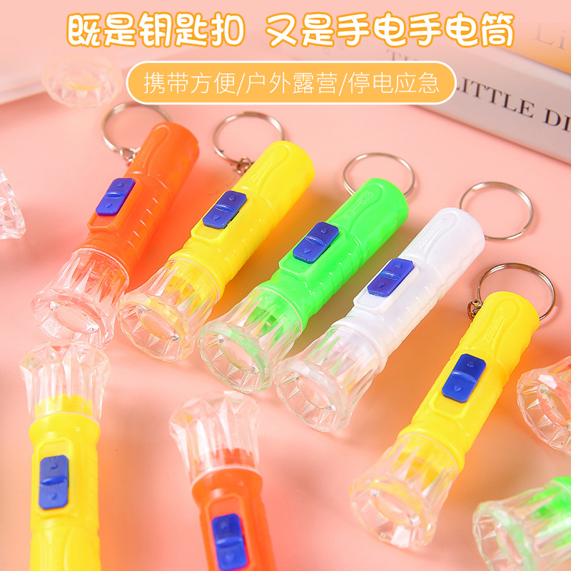 Mini electric lights, small flashlights, LED plastic small flashlights, colorful hand lights, illuminated children's street stall small toys Specification drawing