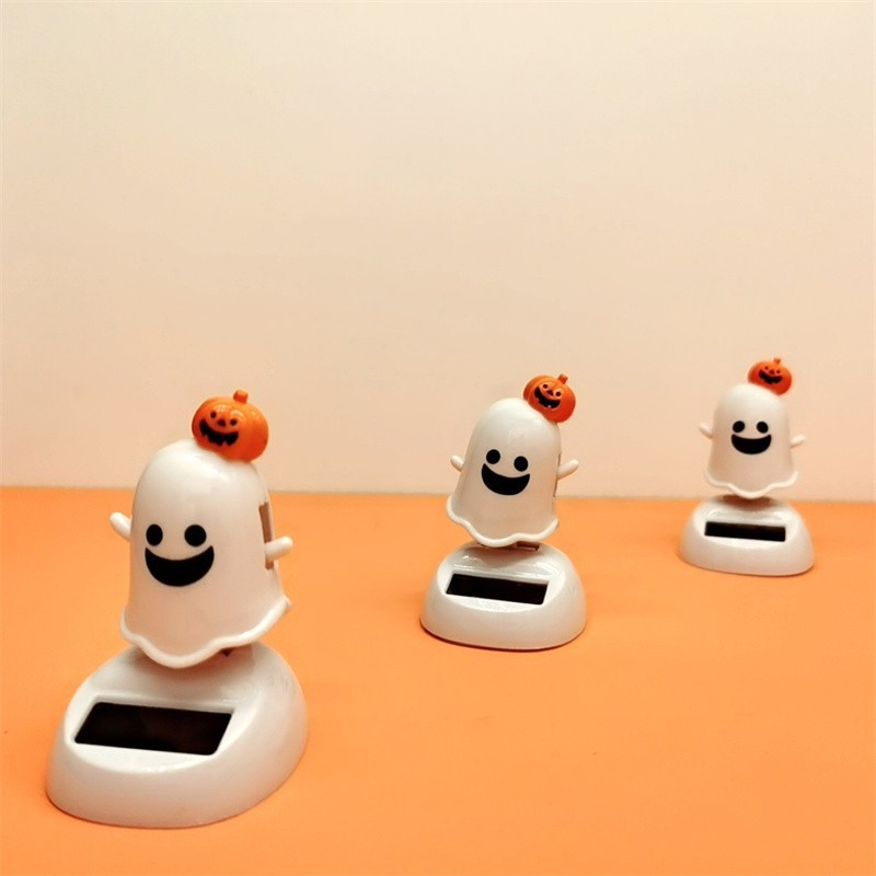 Halloween solar creativo swing swing cabeza boneca coche de juguete fantasma dibujos animados festival de fantasmas coche de juguete Application Scenario
