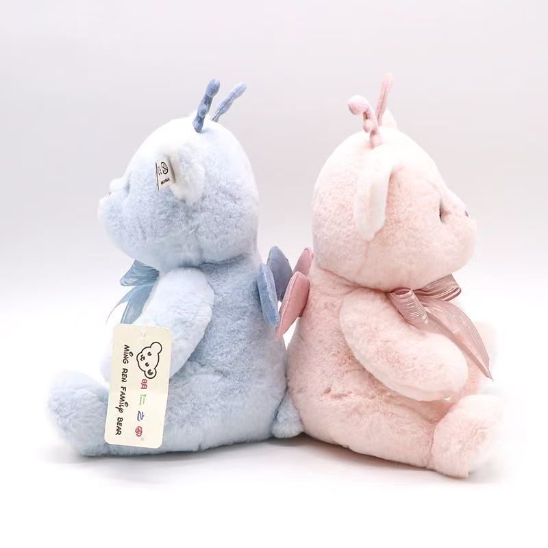 The Mingren series Angel Bear sitting 23CM tall claw doll is a cute animal series plush toy Specification image