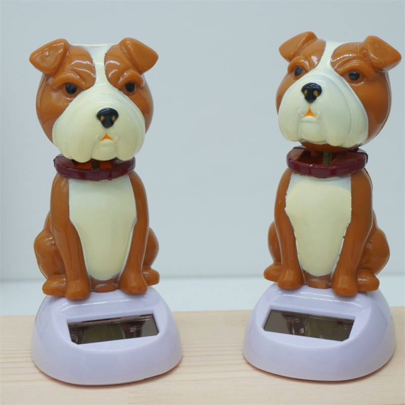 Car ornaments, resin interior decorations, solar car, shaking dog interior accessories, shaking and waving dolls