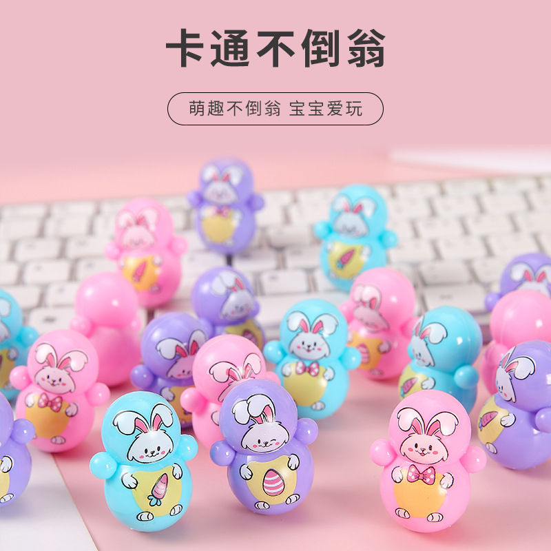 A popular mini cartoon untoppleable doll, Dingdang Cat, a traditional educational toy, and a cute blue fat robot cat gift full figure