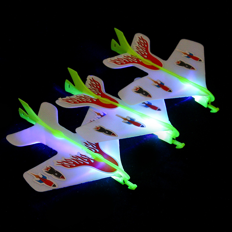 Wholesale of large-sized luminous catapult aircraft, slingshot, flashing elastic aircraft, children's outdoor activity flying toys Specification drawing