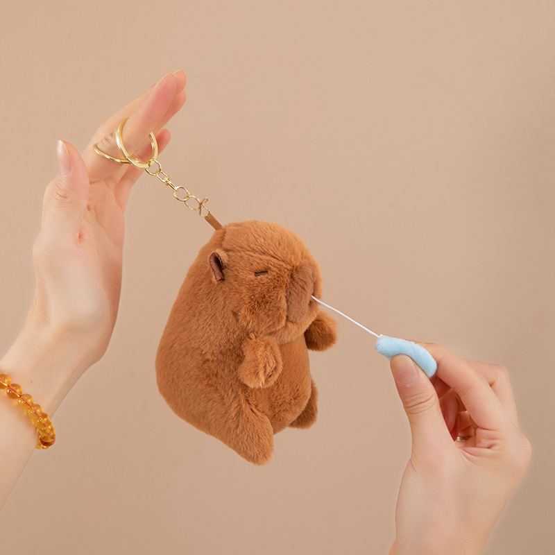 Wholesale of creative plush Kapibara bubble keychains, cute couple schoolbags, key chains and small pendants details Picture