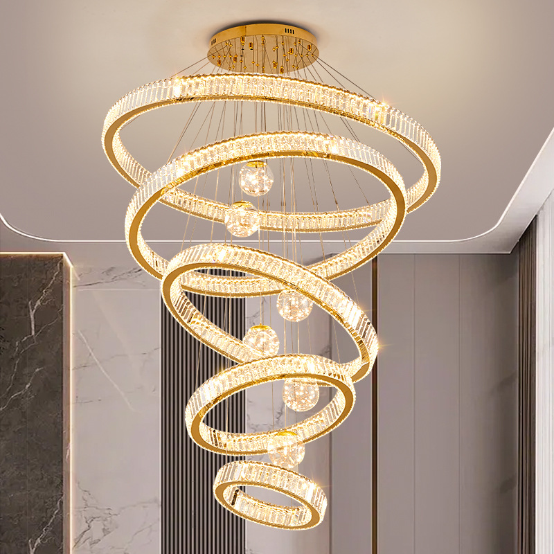 A large chandelier in the spacious living room of a villa, a light luxury mezzanine floor with a high ceiling and a crystal starry sky. A hollow chandelier in a duplex details Picture