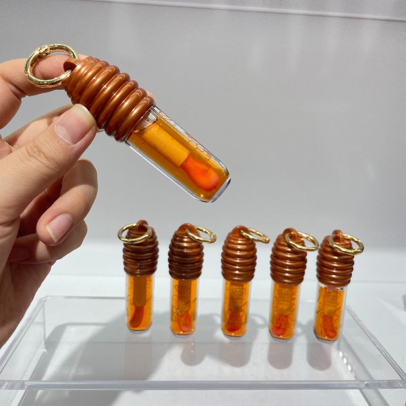 Honey Magic Lip Oil Moisturizes on the mouth change color Lip Oil Factory Store Direct sales Specification image