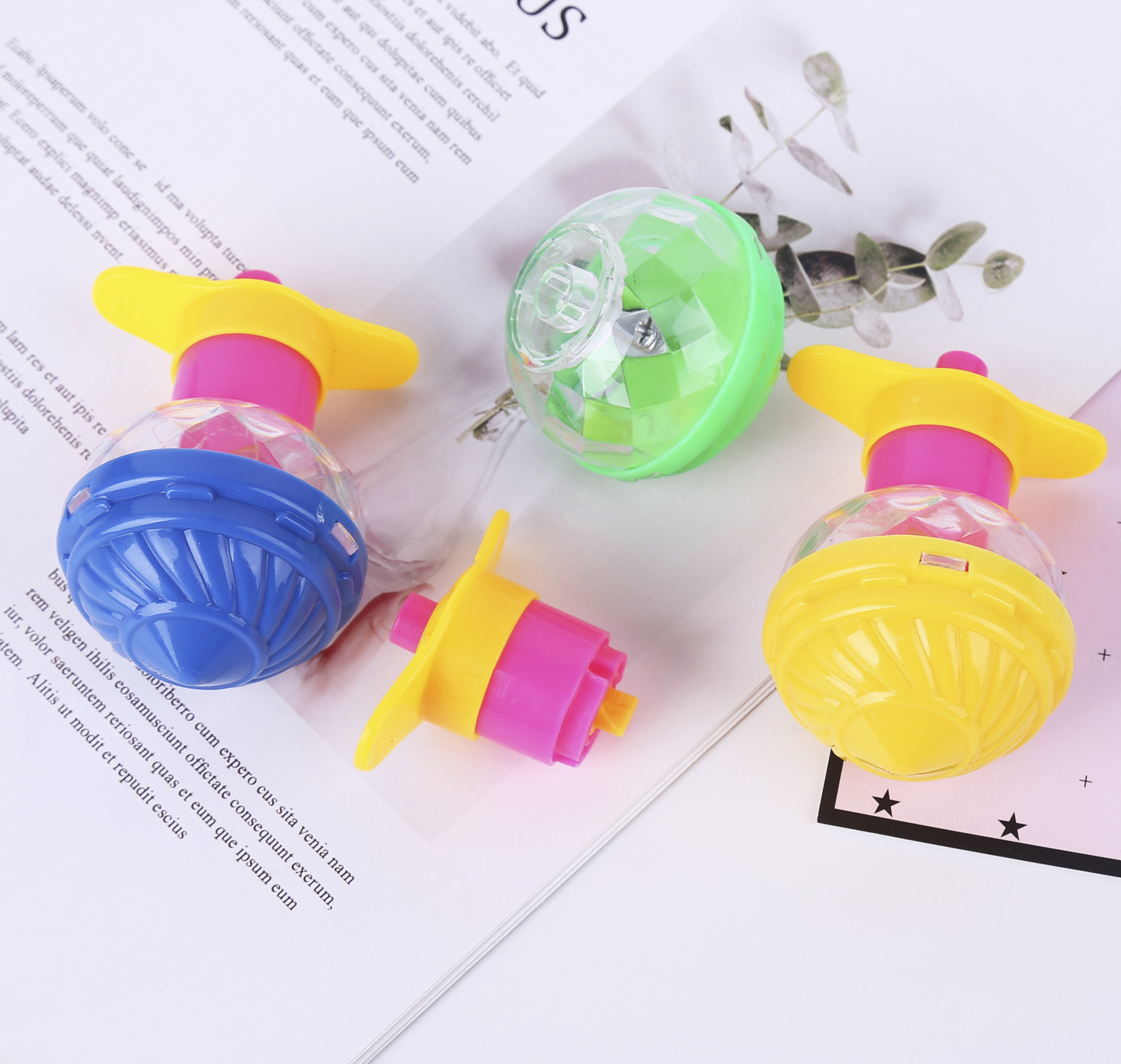 Wholesale of small toy gyroscopes for kindergarten children, luminous high-speed gyroscopes, night market spring toys, and small gifts for students details Picture